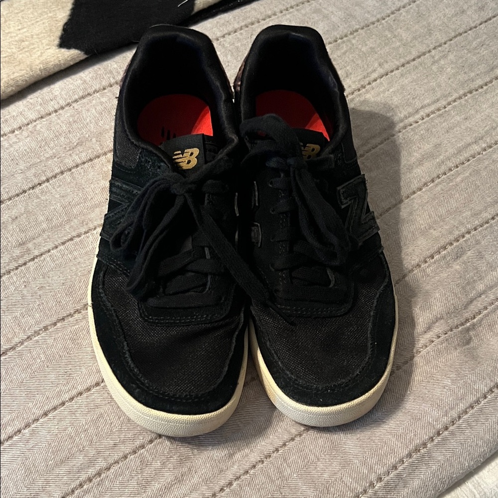 New Balance Black Sneakers with cheetah print on back